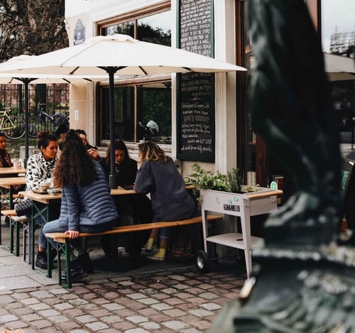 free photo women restaurant umbrella